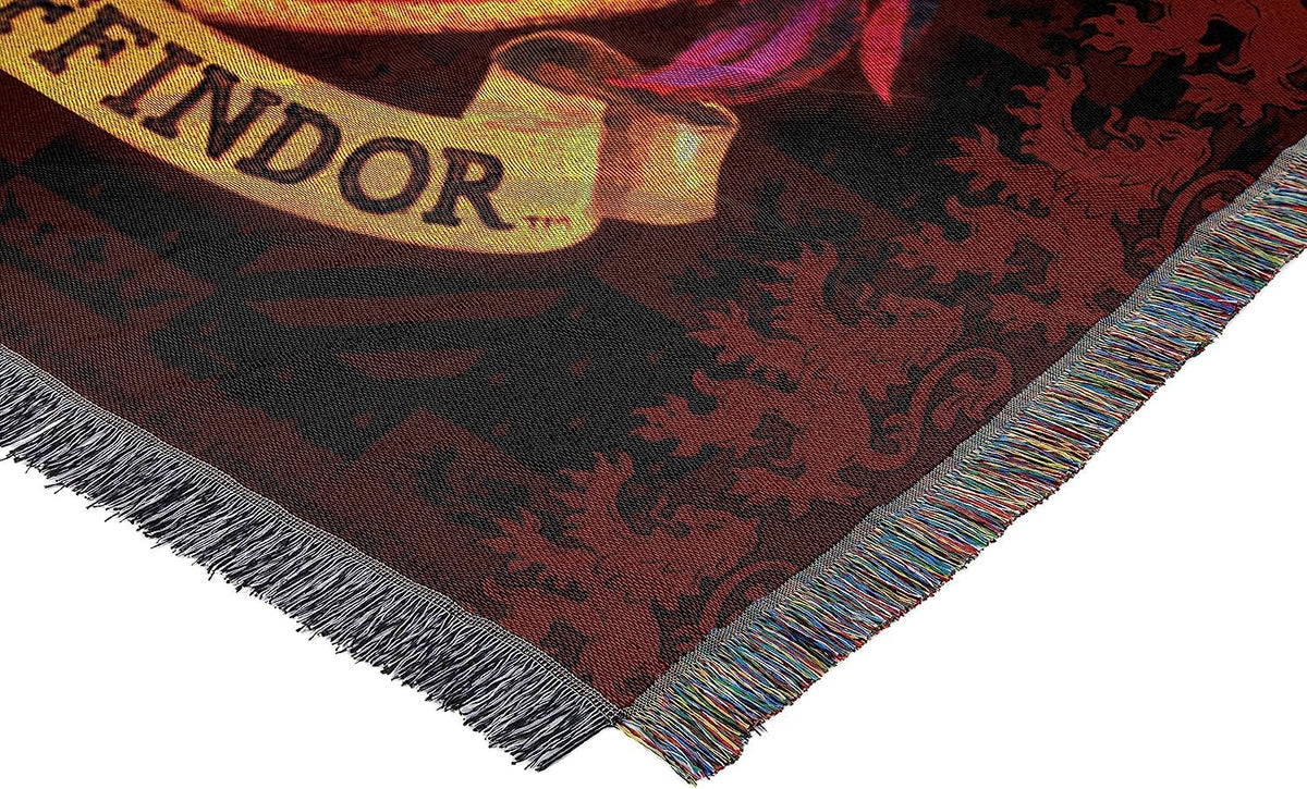 Northwest Gryffindor Shield tapestry throw 48x60 size complements seating areas.