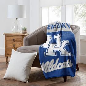 Northwest Kentucky Wildcats throw blanket folded for travel warmth and game day comfort.