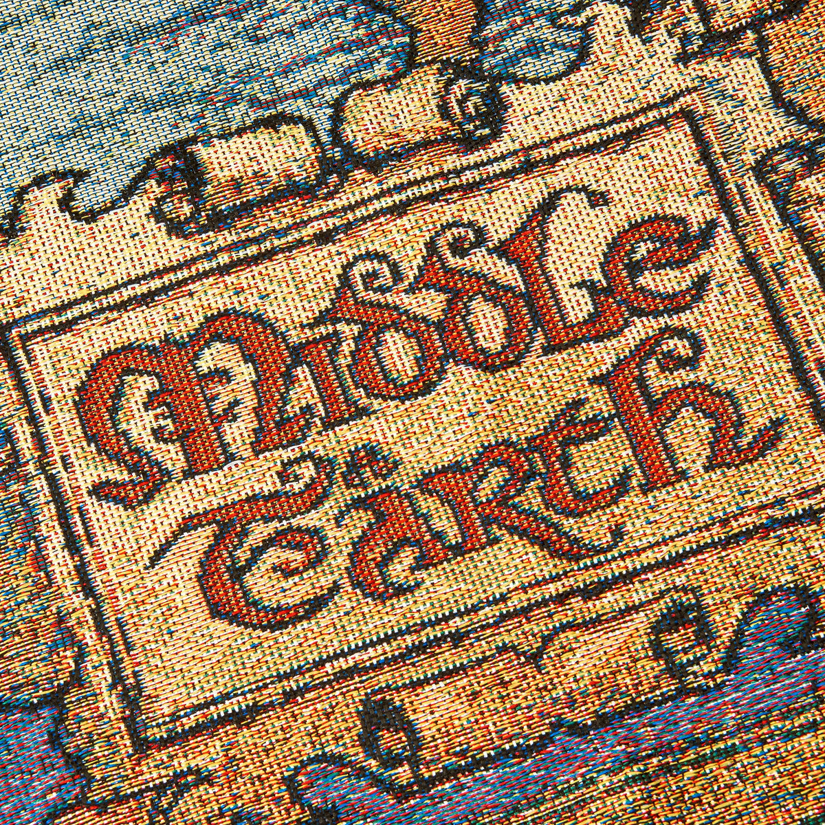 Northwest Lord of the Rings Hobbit tapestry throw on couch adds bold color