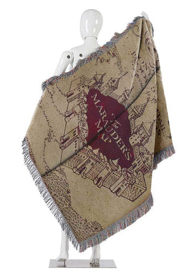 Northwest tapestry closeup reveals rich weave with decorative fringe.