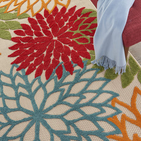 Nourison Aloha green indoor-outdoor spot showcases versatile use in any setting.