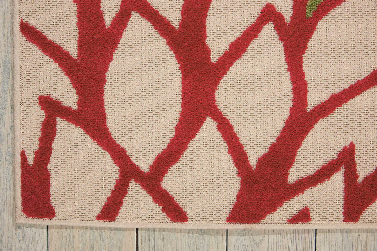 Nourison Aloha green patio-deck rug enhances outdoor living spaces.