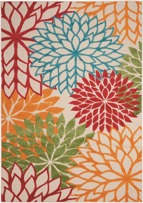 Nourison Aloha green tropical bloom closeup highlights vibrant color and high-low texture.