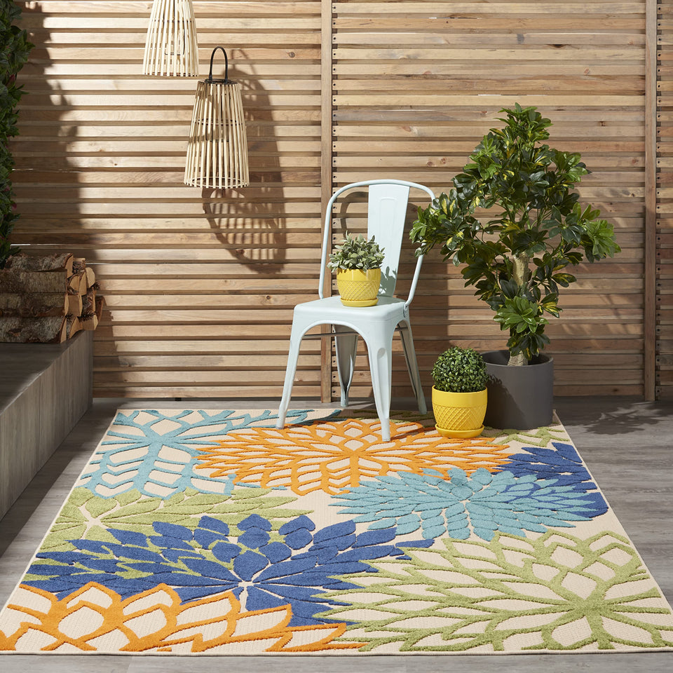 Nourison Aloha rug with tropical floral pattern for bright outdoor patios