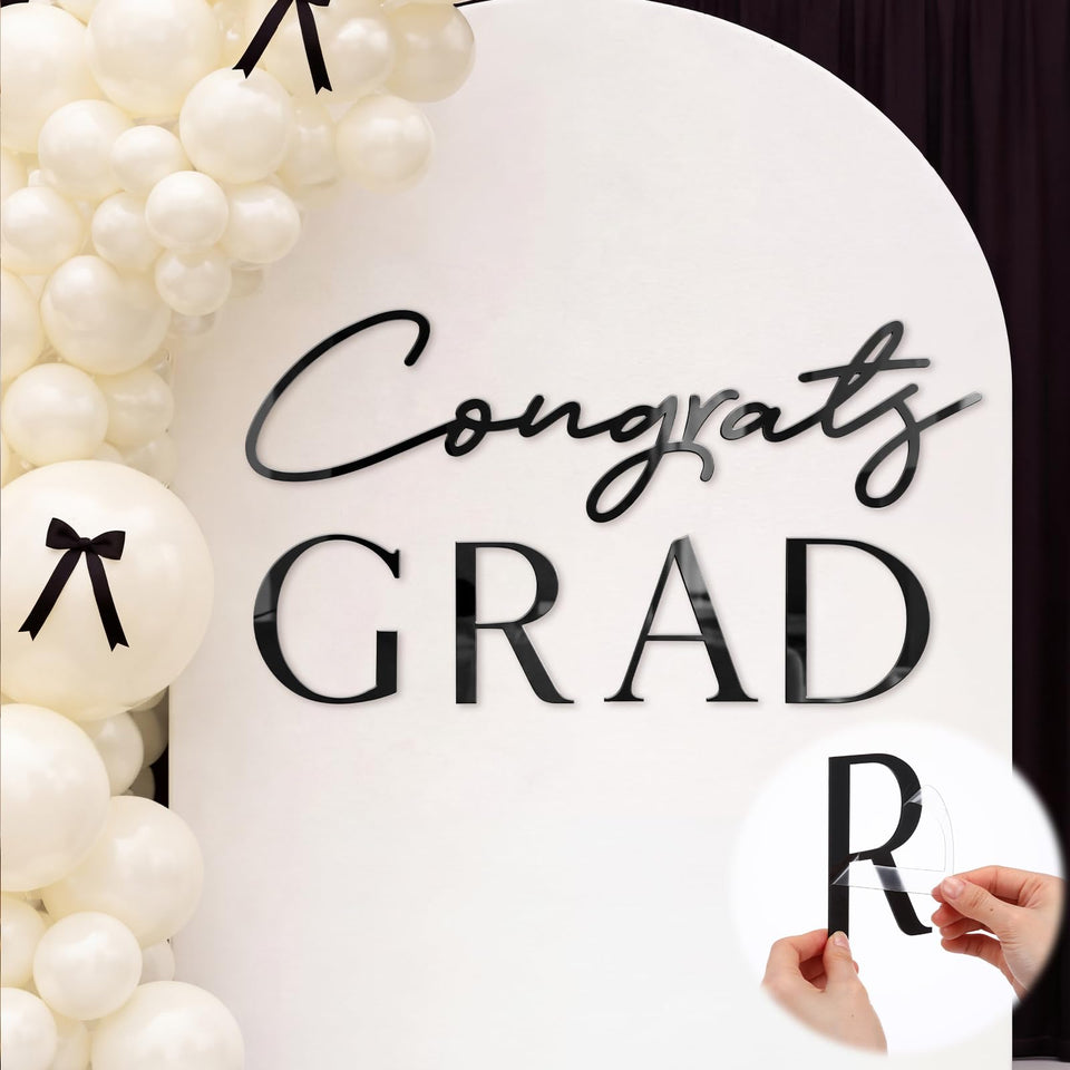 Novabright Congrats Grad sign backdrop enhances graduation photos with striking black mirror finish