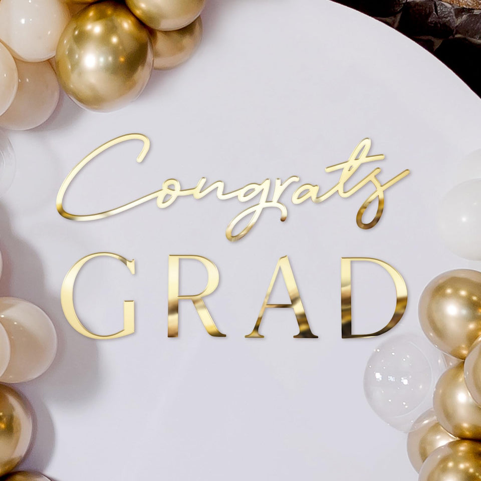 Novabright Congrats Grad sign backdrop in gold mirror for graduation photos.