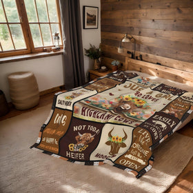 Noxkioy Highland Cow Blanket on couch invites relaxing evenings and comfort.