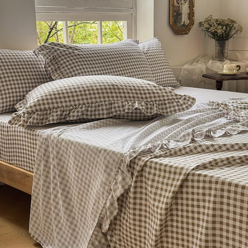 NSNLGSGC tan gingham ruffle queen sheet set on bed with secure, snug fit.
