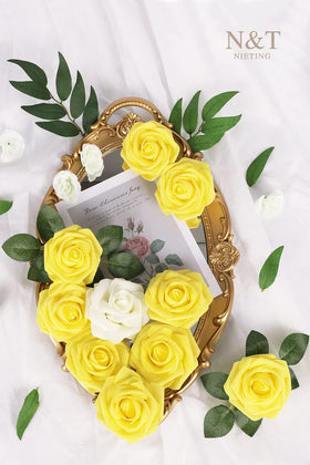 N&T NIETING baby shower decor with yellow roses.