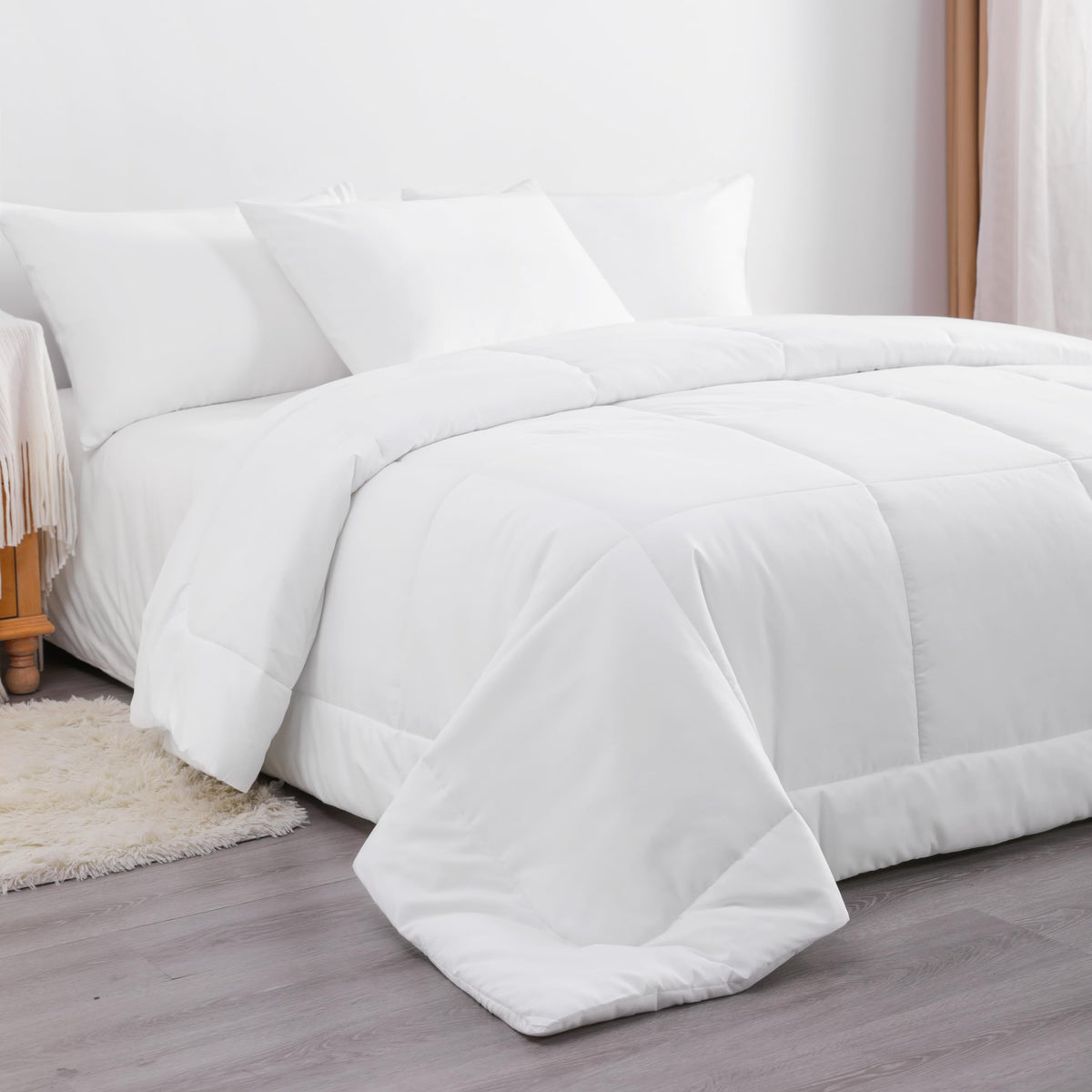 NTBAY Twin Comforter box stitching keeps fill evenly distributed for consistent warmth.