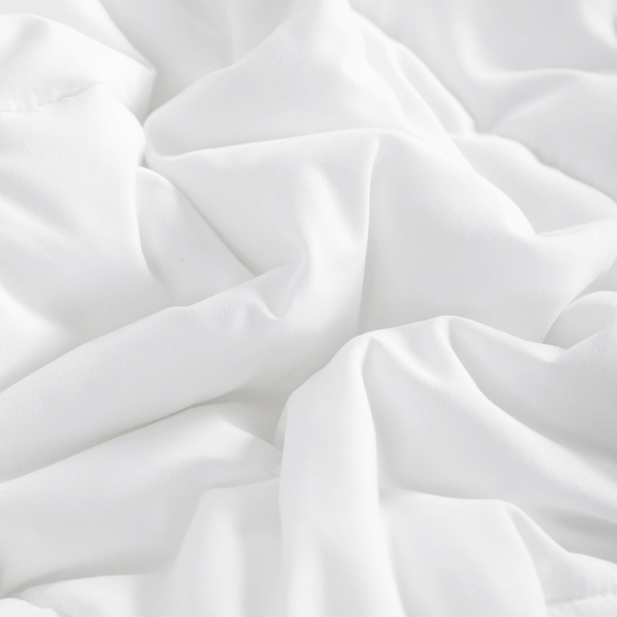 NTBAY Twin Comforter folded close-up showing plush texture and durability.