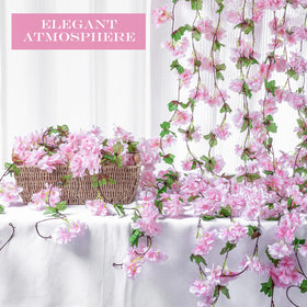 Nuenen cherry blossom vines pink door decor brings delicate floral warmth to venues.
