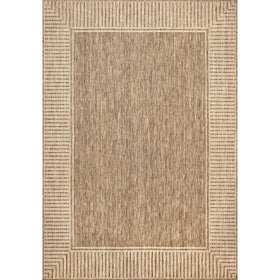 nuLOOM Asha light brown ivory rug adds warmth to outdoor lounges.