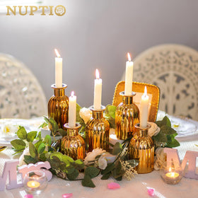 NUPTIO gold bud vases with sturdy base provide stable displays for single stems.