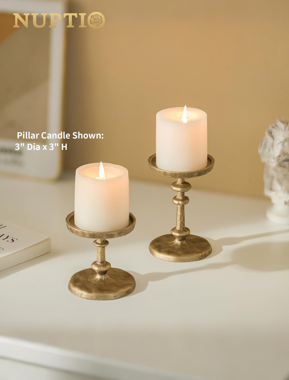 NUPTIO Gold Candle Holders with medium pillar showing antique brass shine