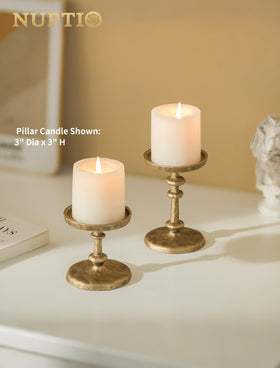 NUPTIO Gold Candle Holders with medium pillar showing antique brass shine