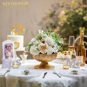 NUPTIO gold compote vase side view showing pedestal base and ornate finish