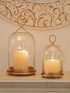 NUPTIO gold glass hurricane lanterns 2-pack front view for elegant outdoor decor.