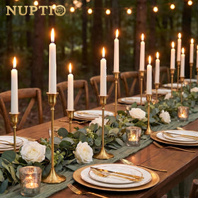 Nuptio gold taper stand holds standard candles for refined setups.