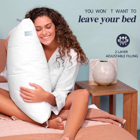 Hotel-style Nuzzle pillows displayed for a plush, luxurious bedroom look.