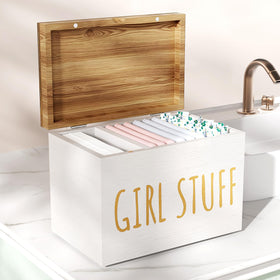 Nyellevario tampon holder with hinged lid keeps bathroom essentials neatly organized.