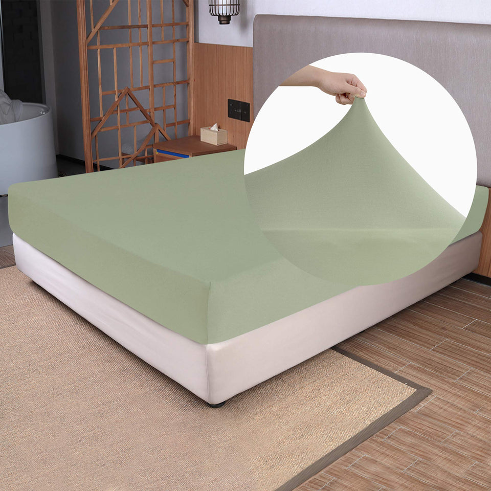 N&Y HOME soft stretch king fitted sheet on bed, sage green, snug fit.