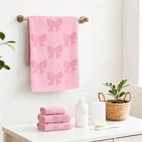 NZNDB pink towel set in a spa-like setup illustrating versatility.