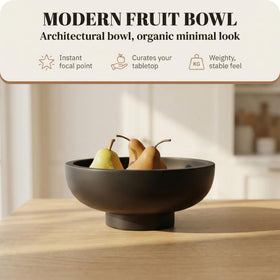 OAKOA concrete bowl with elevated foot detail adds elegant elevation.