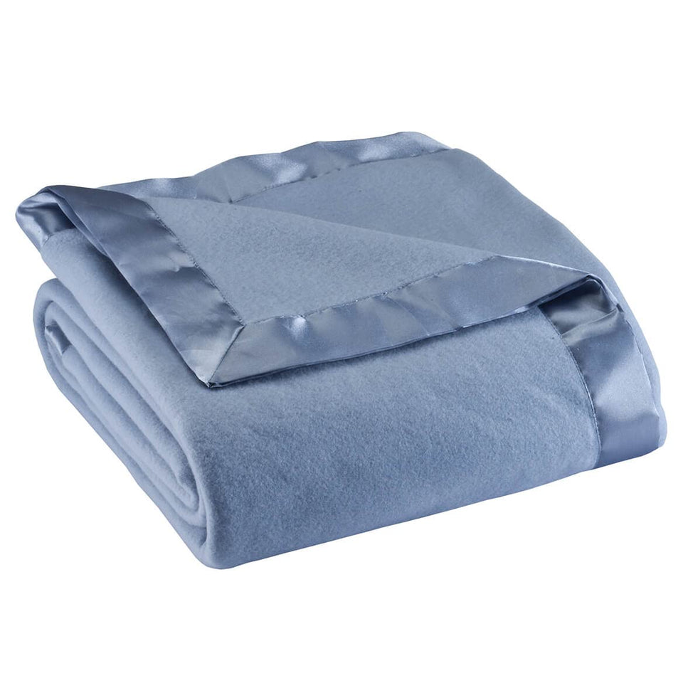 OakRidge satin fleece blanket closeup texture showcases plush softness for cozy nights.