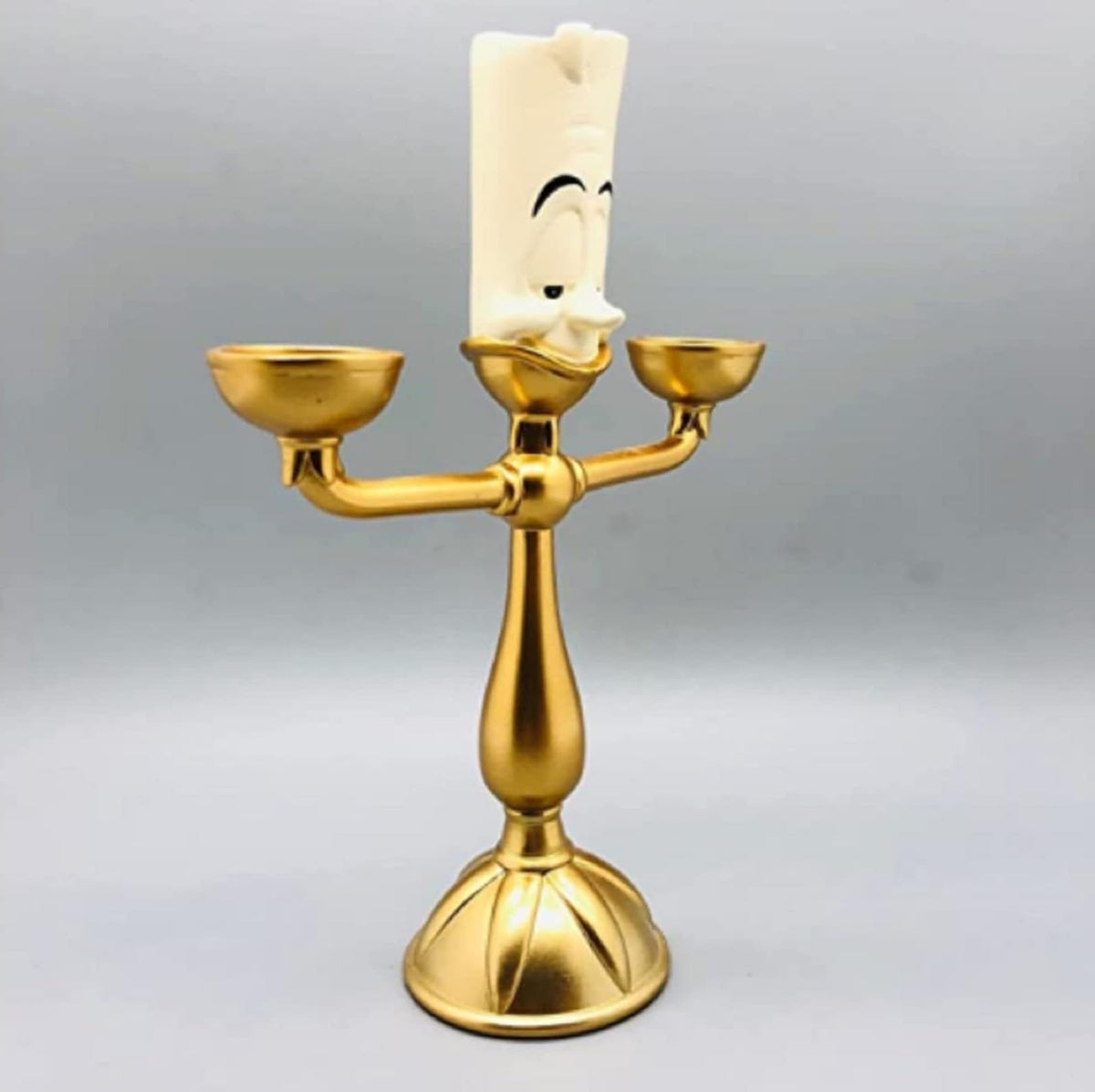 OC PCRN Beauty and The Beast candelabra polyresin finish ensures durable home décor.