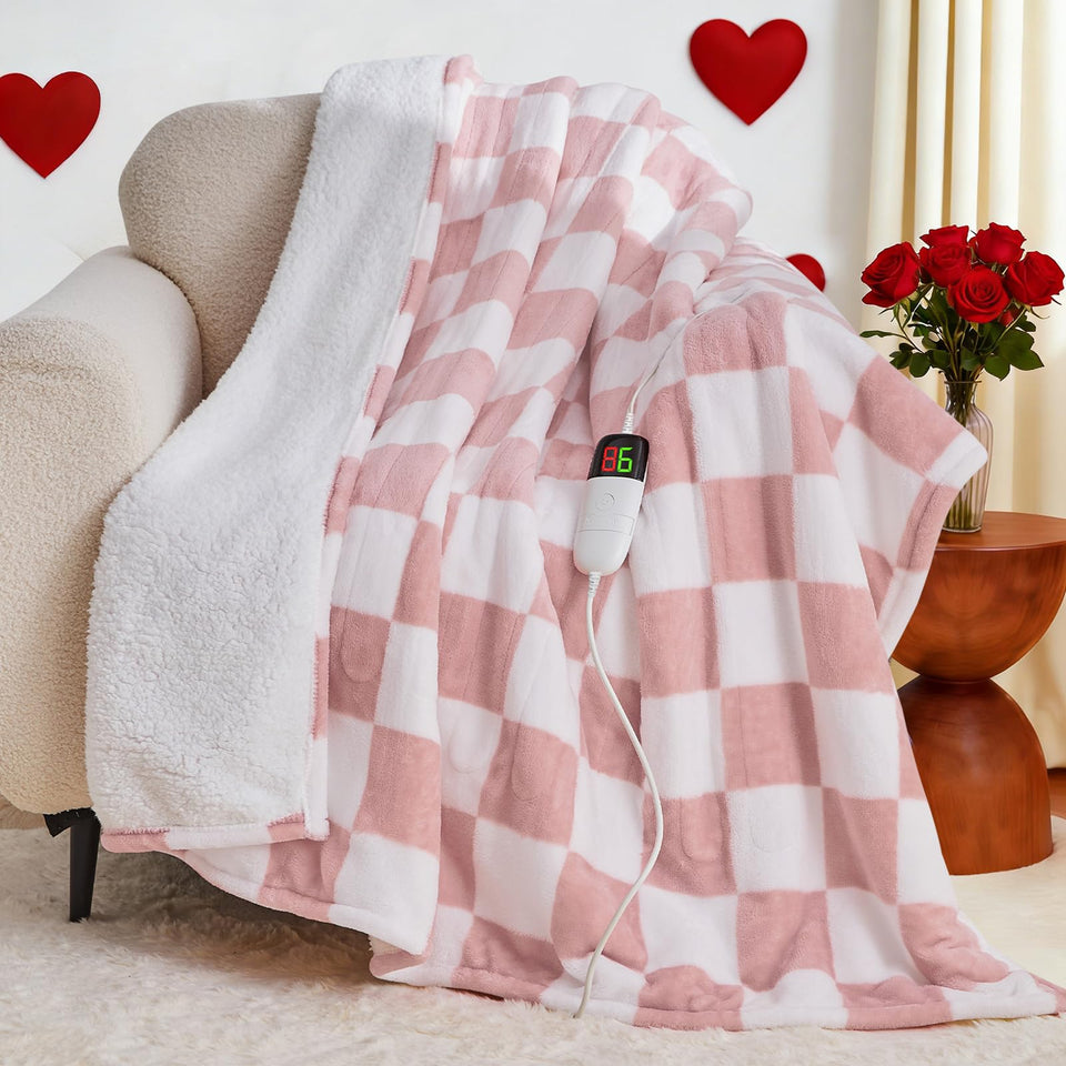 OCTROT light pink heated blanket throw on front view providing cozy warmth
