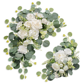 Odouzy artificial wedding arch flowers frame the welcome sign with lasting color.