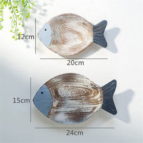 OECECR multi-colored distressed fish decor for coastal spaces.