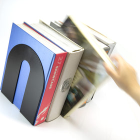 Officemate black metal bookends on a desk add a professional touch to the workspace.