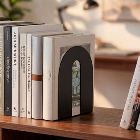 Officemate non-slip base protects surfaces and keeps bookends from sliding.
