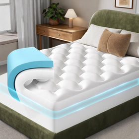 OhGeni mattress topper pad on a queen bed showing dual-layer cooling for comfort