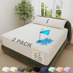 OhGeni waterproof mattress protector in queen size, two-pack, protects against spills and leaks.
