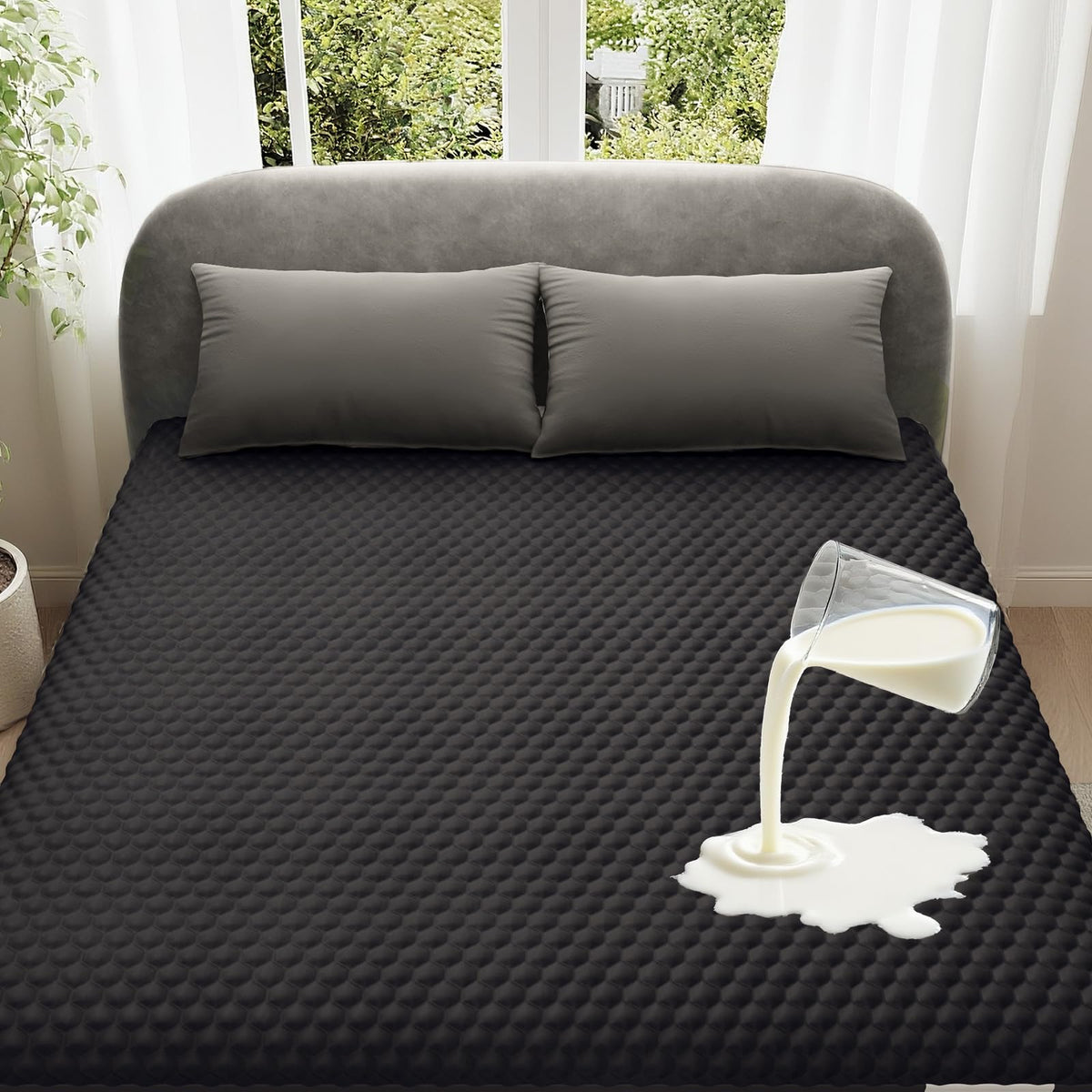 OhGeni waterproof mattress protector for queen beds with a 6-20 inch deep pocket keeps spills away.