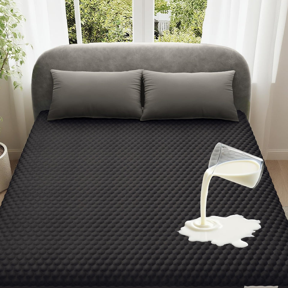 OhGeni waterproof mattress protector for queen beds with a 6-20 inch deep pocket keeps spills away.