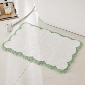 Ohocut luxury bath rug in white with sage green scalloped piping for serene bathroom decor.