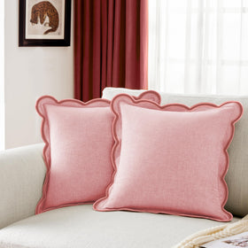 Ohocut scalloped edge pillow cover in blush pink adds soft texture to a sofa.
