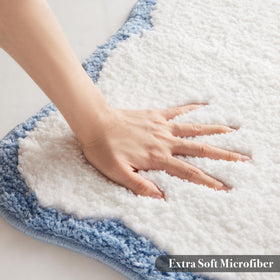 Ohocut white bath rug 32x20 complements modern bathroom layouts.