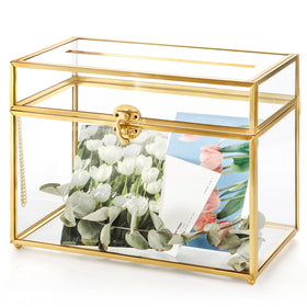 Okllen glass wedding card box with lock and slot on a reception table secures guest cards.