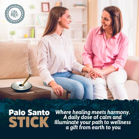 OLA BLUE Smudging setup with Palo Santo in a tranquil space.
