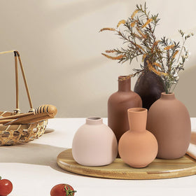 OLACHIKKO neutral vase set in taupe matte finish adds calm balance to shelves.