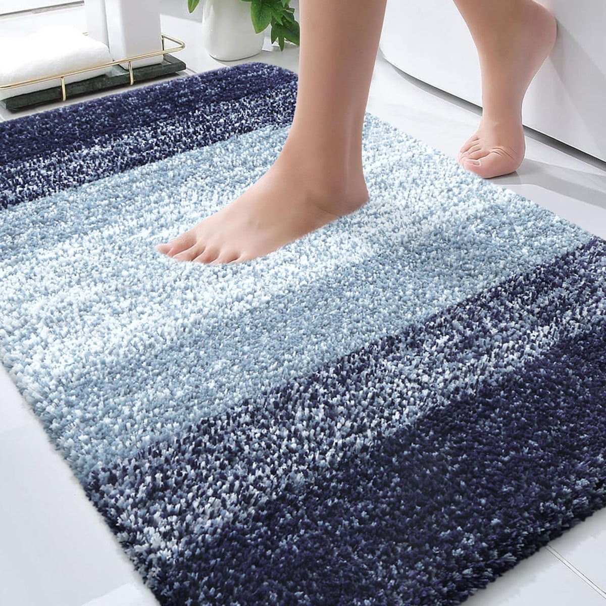 OLANLY bath mat with soft microfiber pile for warm, comfortable feet.
