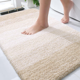 OLANLY bath mat with plush-pile texture delivers warm, foot-friendly comfort after a shower