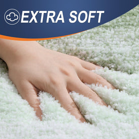 OLANLY bath mat featuring absorbent shaggy fabric dries feet quickly.