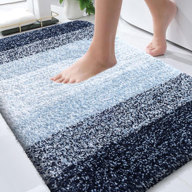 OLANLY bath rug 30x20 navy with gradient stripes enhances bathroom decor.