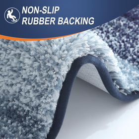 OLANLY geometric blue rug adds decorative warmth to modern bathrooms.